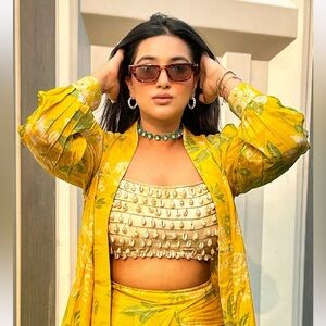 Floral yellow dhoti shirt set  maang tikka and matching earrings free .